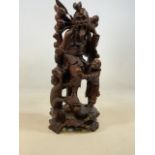 A chinese carved figure. H:41cm