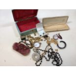A quanity of costume jewellery including earrings, cuff links, necklaces and others