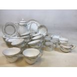 A Royal Worcester Harvest Ring tea and coffee set comprising tea cups and saucers, coffee cups and