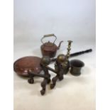 A pair of cast iron fire dogs, a copper kettle, warming pan and other items