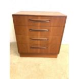 A mid century teak G Plan chest of four drawers with Label. W:72cm x D:45cm x H:76cm