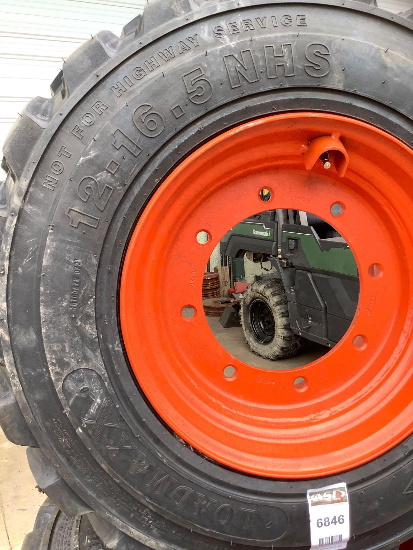 ( 4 ) LOADMAXX 12-16.5 N.H.S TIRES FOR SKID STEER, 8 LUG HOLES , 12 PLY RATING - Image 3 of 4