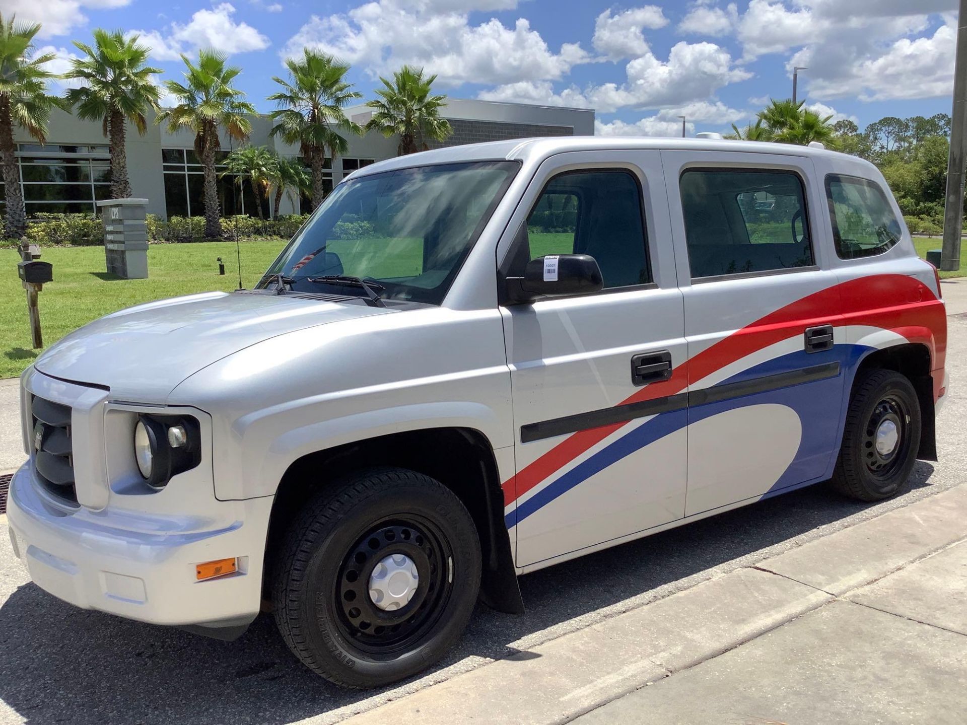 2014 AM GENERAL MV-1 MOBILITY VAN MODEL MV1GD TYPE M.P.V , GAS, AUTOMATIC, APPROX GVWR 6600 LBS, POW