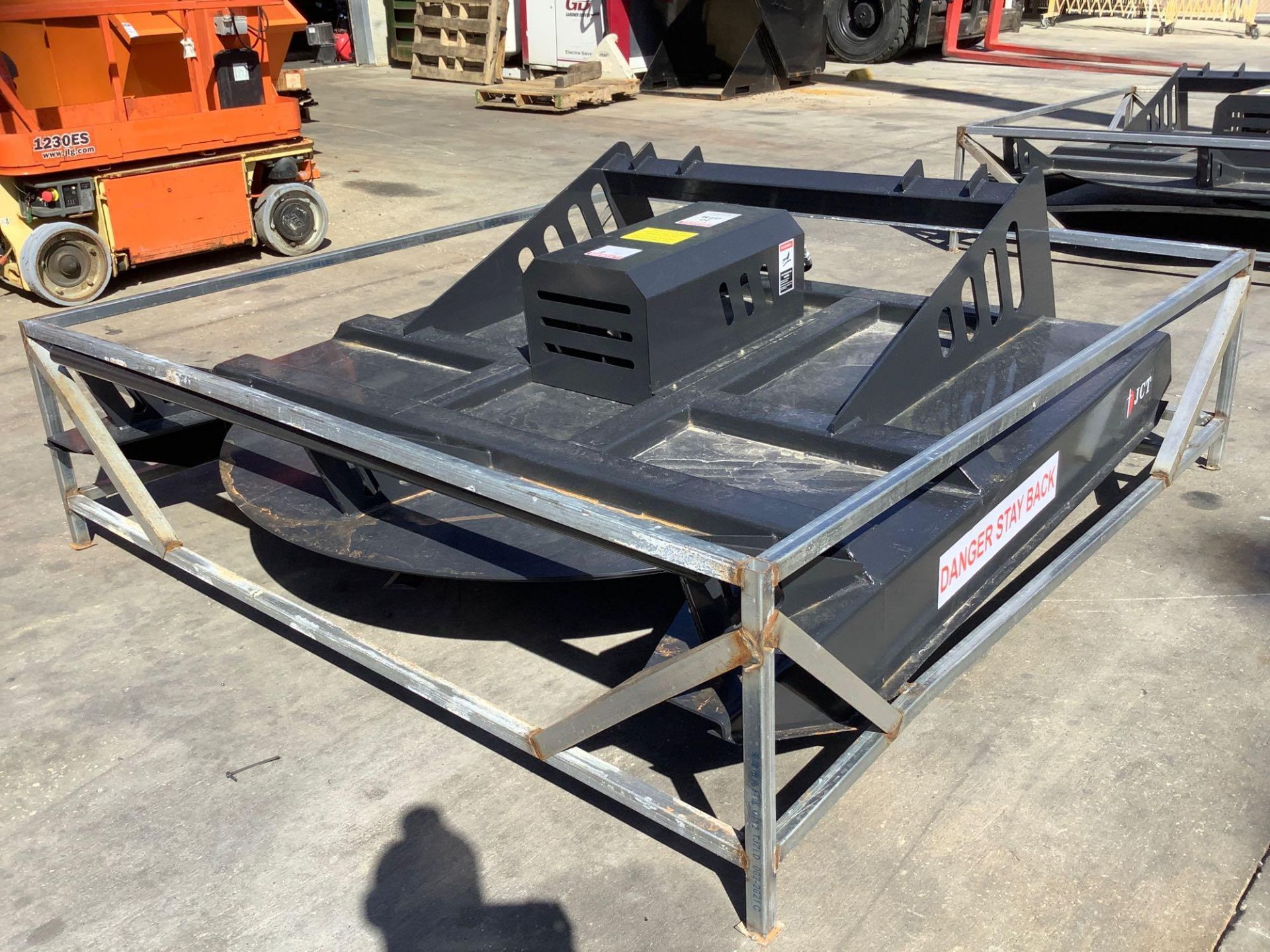 UNUSED JCT BRUSH CUTTER WITH STUMP JUMPER ATTACHMENT FOR UNIVERSAL SKID STEER, APPROX 72"