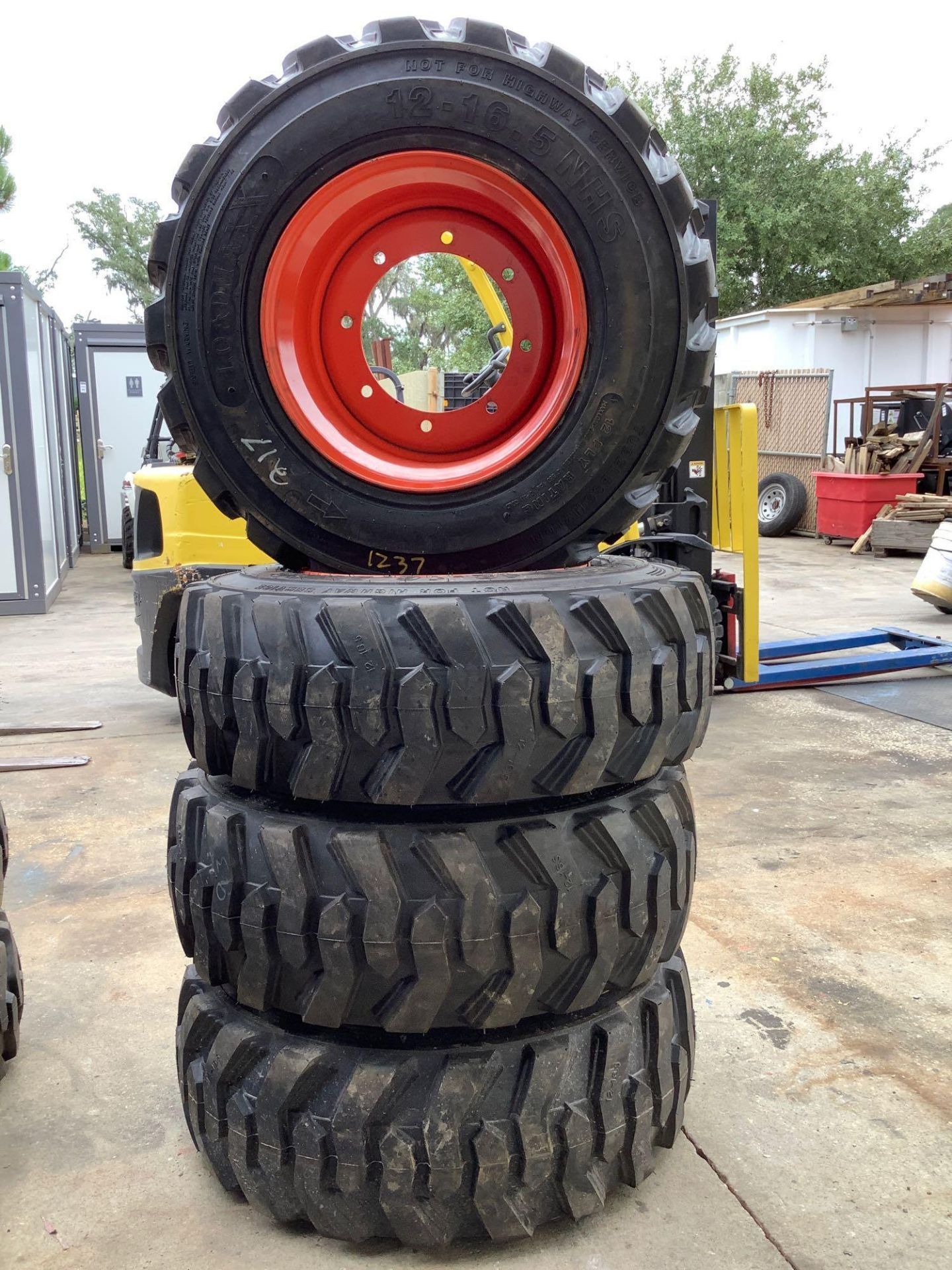 ( 4 ) LOADMAXX 12-16.5 N.H.S TIRES FOR SKID STEER, 8 LUG HOLES , 12 PLY RATING - Image 2 of 4