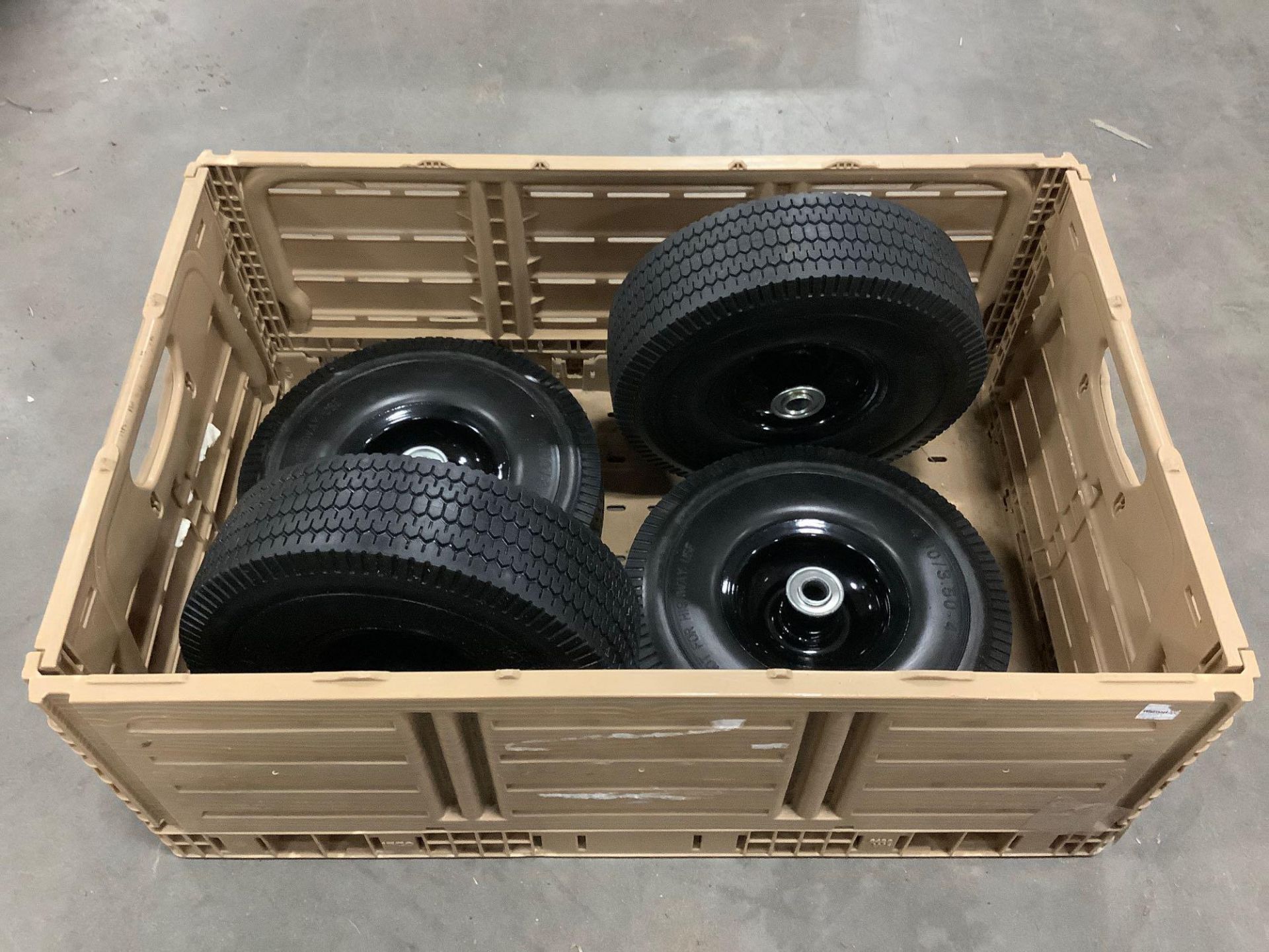 ( 4 ) UNUSED 10” SOLID TIRES 4.10/3.50-4 WITH CARRYING CRATE