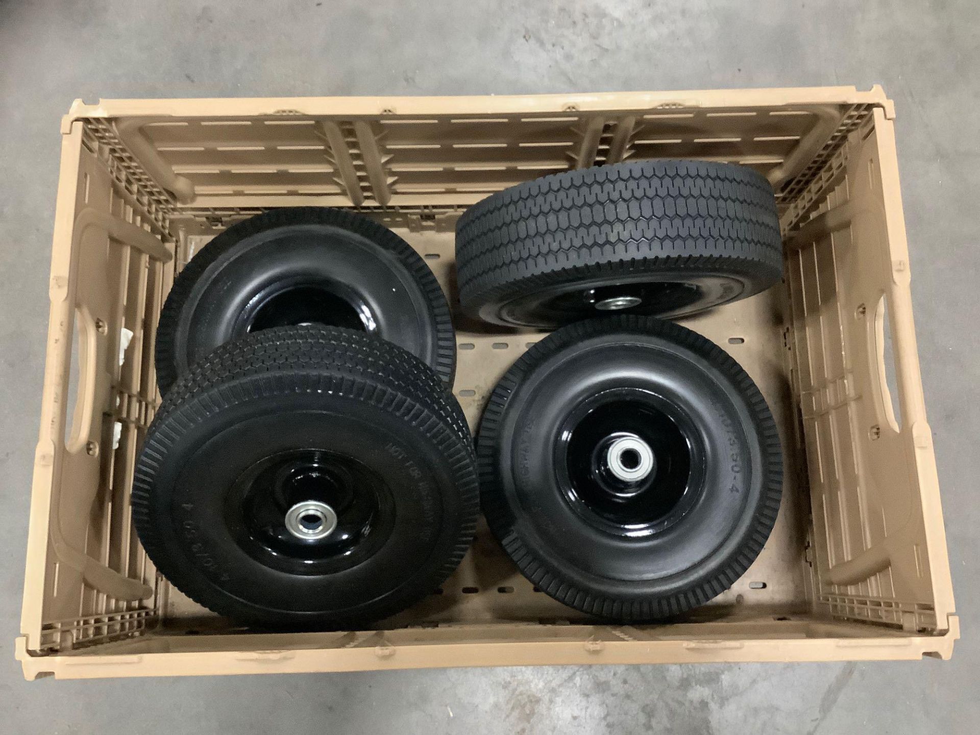 ( 4 ) UNUSED 10” SOLID TIRES 4.10/3.50-4 WITH CARRYING CRATE - Image 2 of 3