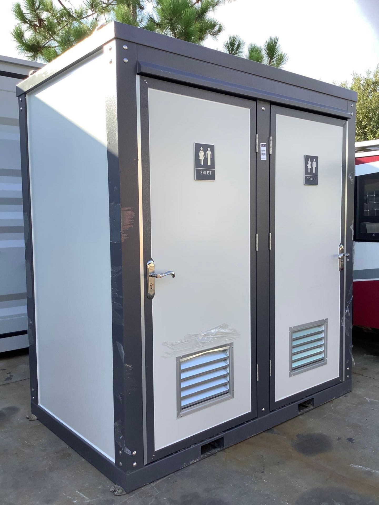 UNUSED PORTABLE DOUBLE BATHROOM UNIT, 2 STALLS, ELECTRIC & PLUMBING HOOK UP WITH EXTERIOR PLUMBING C