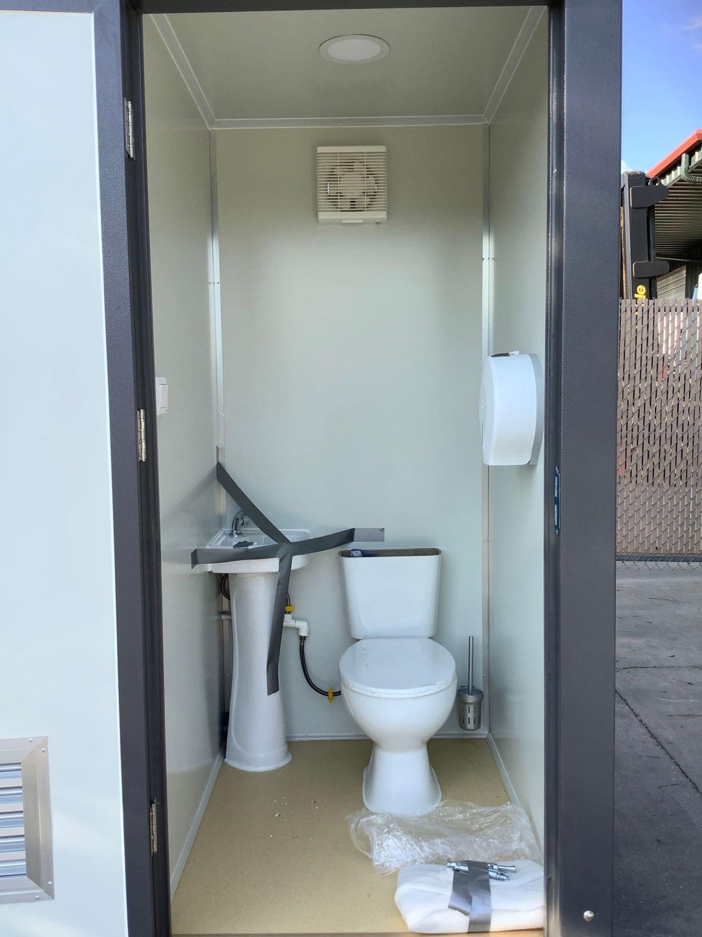 UNUSED PORTABLE DOUBLE BATHROOM UNIT, 2 STALLS, ELECTRIC & PLUMBING HOOK UP WITH EXTERIOR PLUMBING C - Image 11 of 13