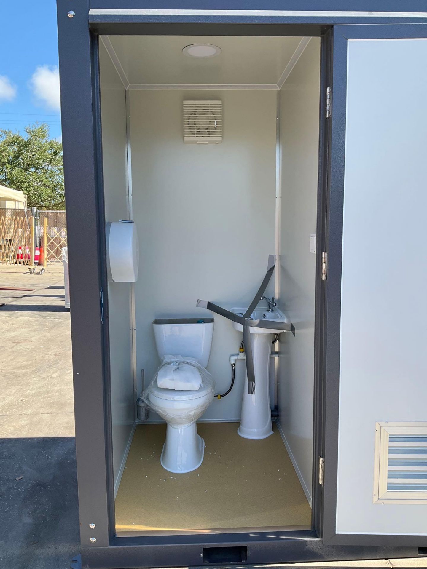 UNUSED PORTABLE DOUBLE BATHROOM UNIT, 2 STALLS, ELECTRIC & PLUMBING HOOK UP WITH EXTERIOR PLUMBING C - Image 14 of 16