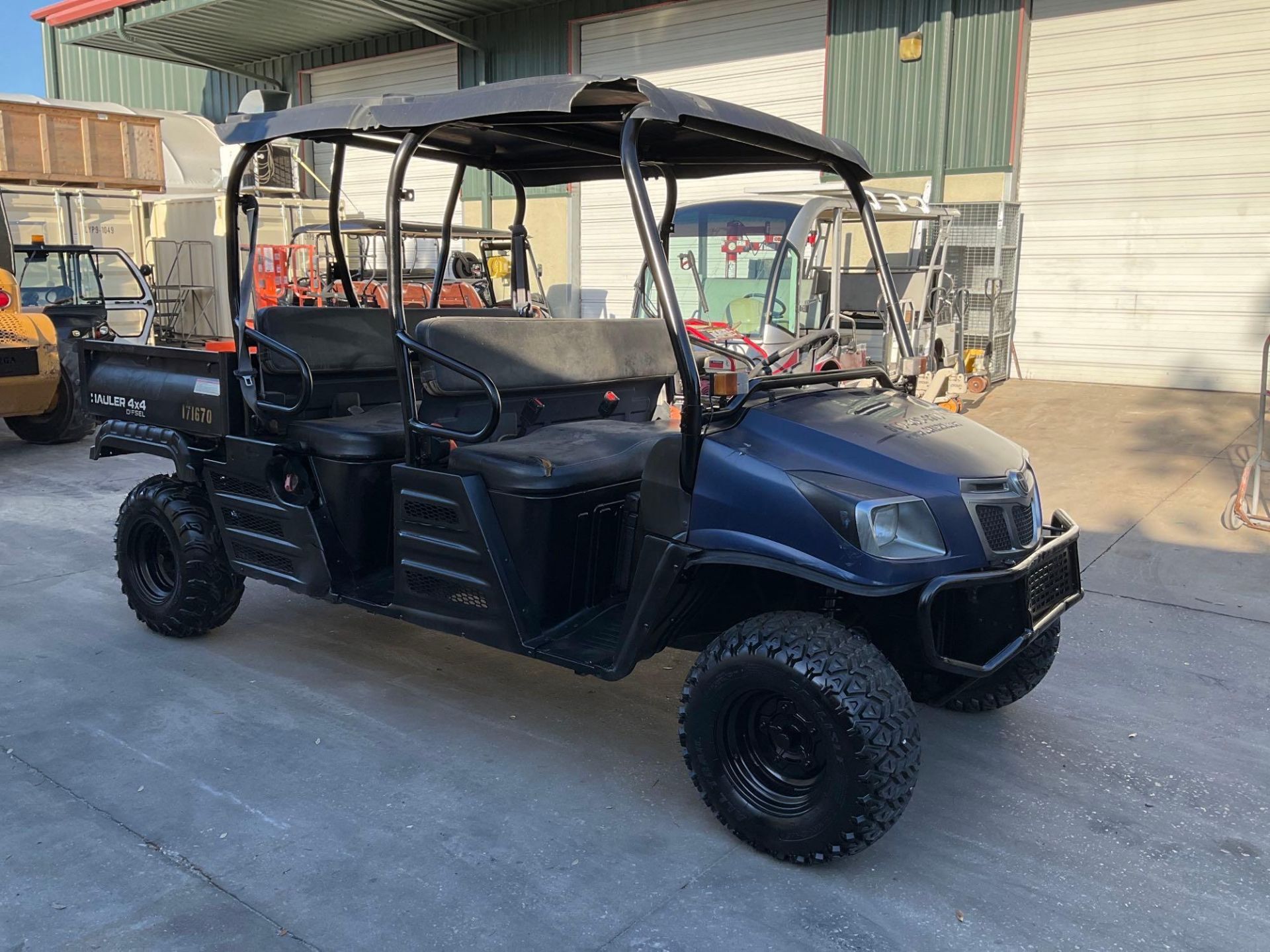 CUSHMAN HAULER 4x4 UTV, DIESEL, CREW CAB, MANUAL DUMP BED, NEW BATTERY, RUNS AND OPERATES - Image 6 of 11