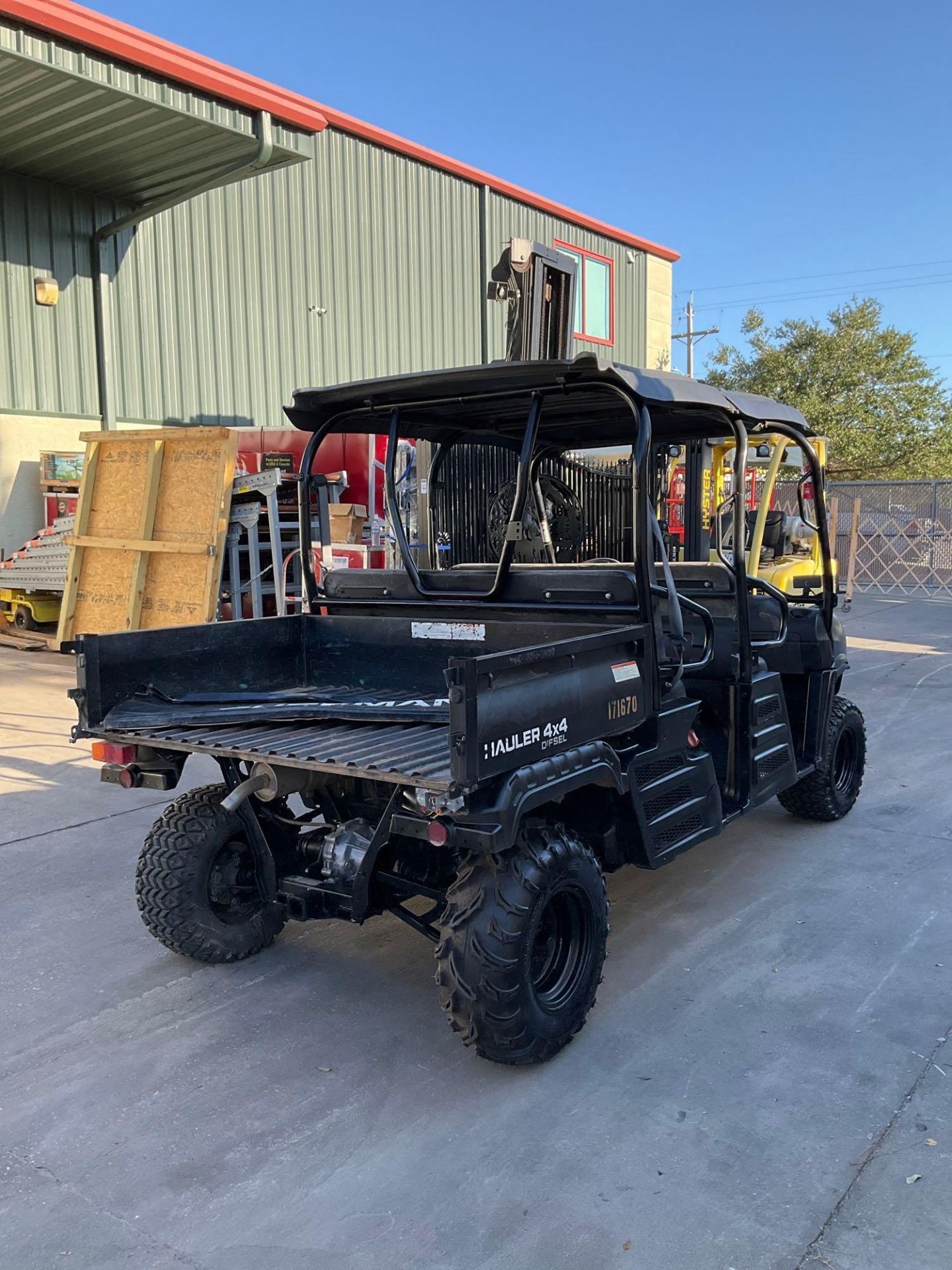 CUSHMAN HAULER 4x4 UTV, DIESEL, CREW CAB, MANUAL DUMP BED, NEW BATTERY, RUNS AND OPERATES - Image 5 of 11