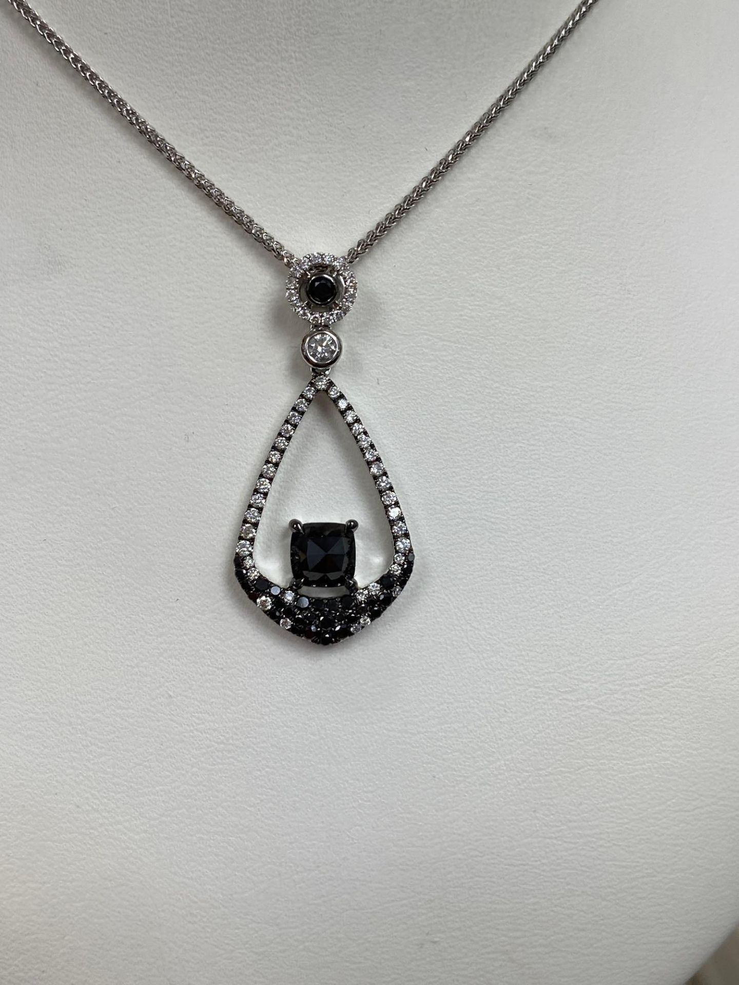 .87 CT BLK DIAMOND CENTER .36CT WHITE DIA .28CT BLK DIAMONDS 18K WHITE GOLD