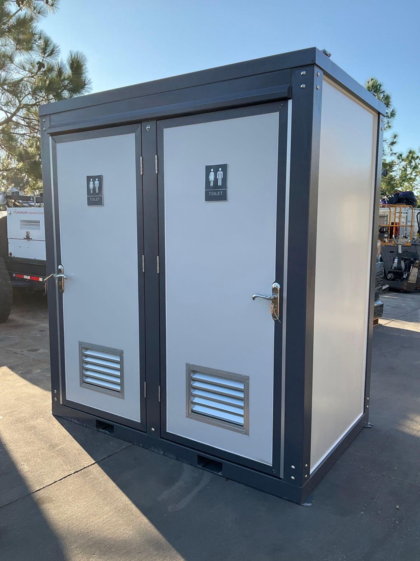 UNUSED PORTABLE DOUBLE BATHROOM UNIT, 2 STALLS, ELECTRIC & PLUMBING HOOK UP WITH EXTERIOR PLUMBING C