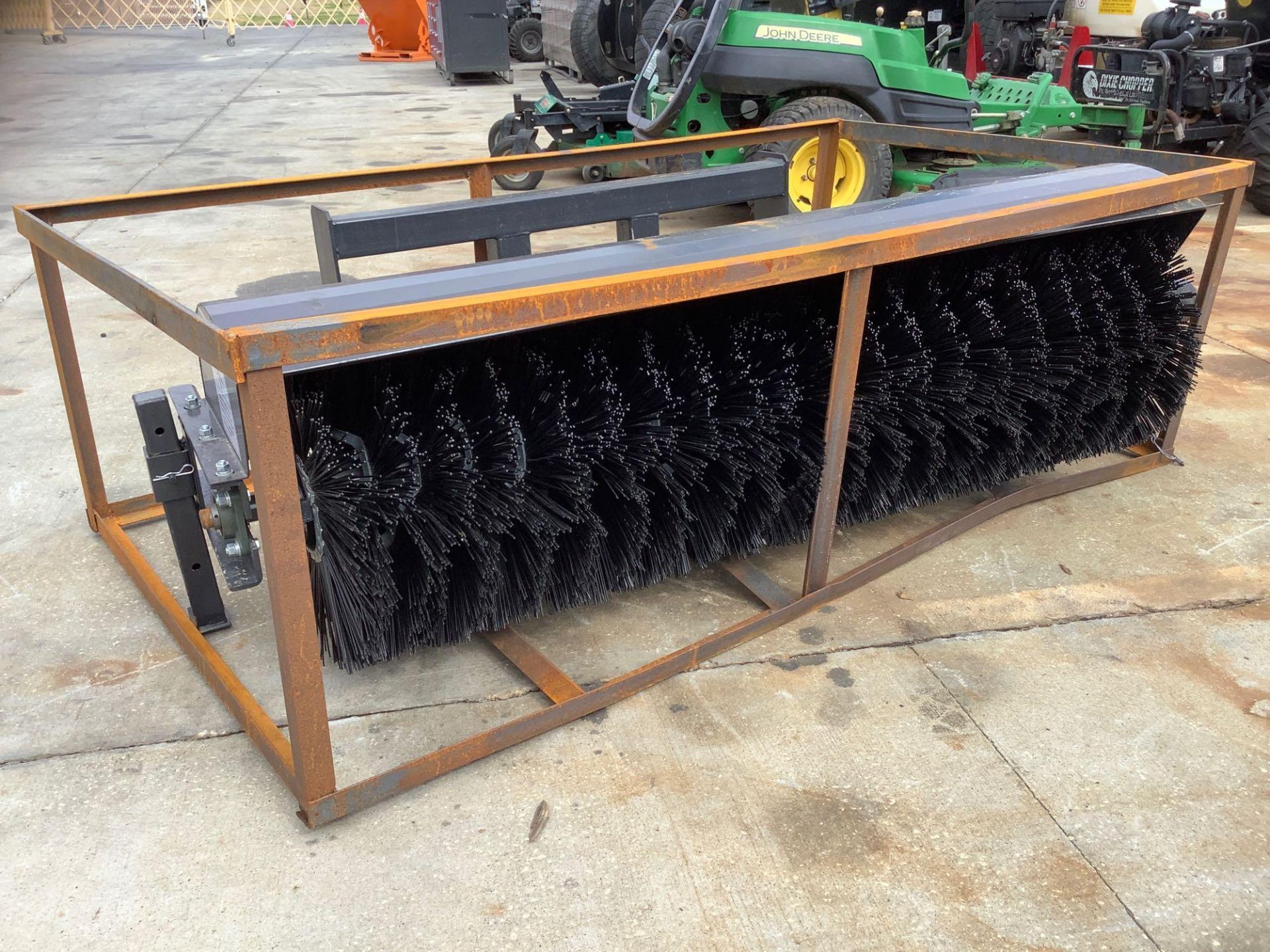 UNUSED WOLVERINE HYDRAULIC DRIVE POLYBROOM ATTACHMENT FOR UNIVERSAL SKID STEER, APPROX 72”