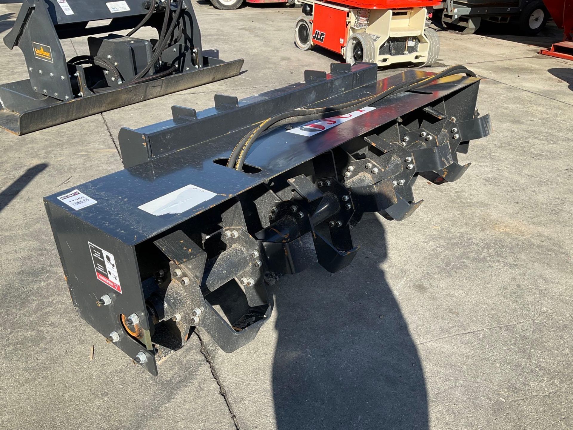 UNUSED TILLER ATTACHMENT FOR UNIVERSAL SKID STEER , APPROX 72”