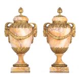 (T) A fine pair of Neoclassical marble cassolettes, H 46 cm