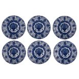 A collection of six Delft blue and white flower basket chargers, marked 'De Klauw', 18thC, ø 35 cm