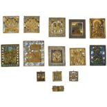 (T) Collection of 14 smaller brass icons, some decorated with enamel, 18th - 19thc