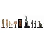 A collection of 10 Egyptian works of art in various materials, 7,6 - 23,5 cm (+)