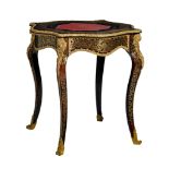 A fine Napoleon III Boulle work games table, with gilt bronze mounts and a red leather inlaid playin