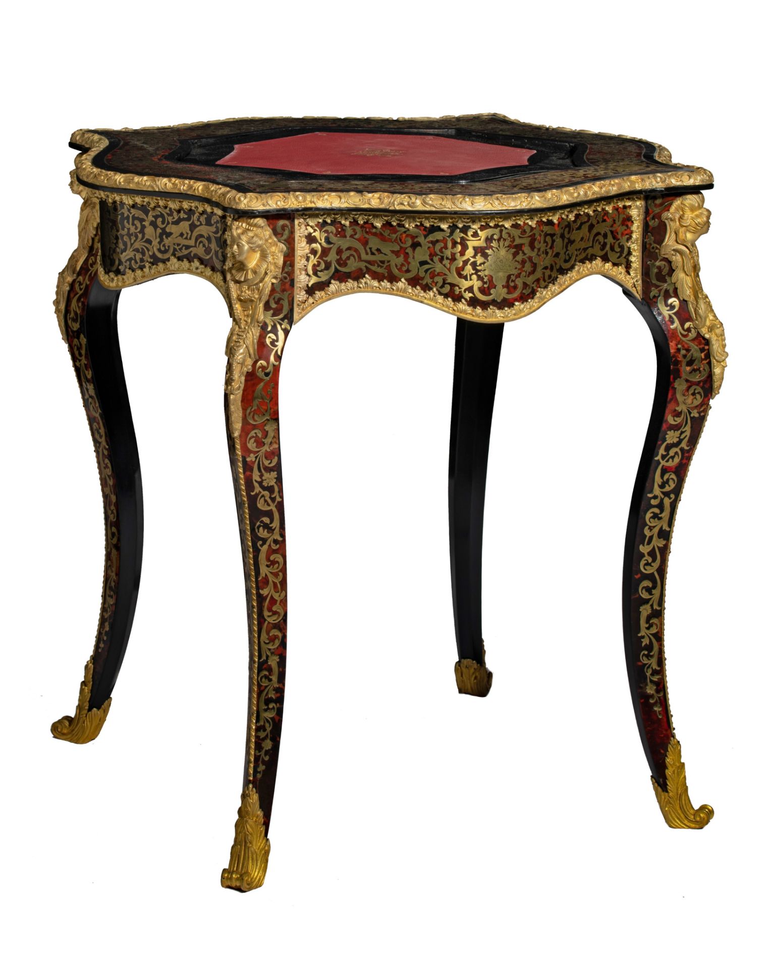 A fine Napoleon III Boulle work games table, with gilt bronze mounts and a red leather inlaid playin