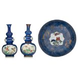 Two Chinese powder-blue ground and famille verte triple-gourd vases and a ditto plate, Kangxi period