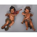 (T) A pair of decorative music playing angels, 20thC, H 55 cm