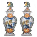 A pair of Delft Rococo vases and covers, marked 'De Drie Klokken', 18thC, H 34,5 cm