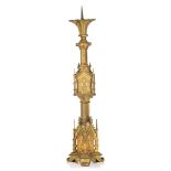 (T) A Gothic Revival gilt metal candleholder, H 112 cm