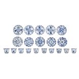 A collection of Chinese blue and white floral decorated teaware, Kangxi period, H 7 - ø 13 cm