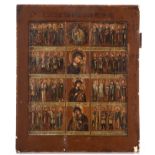 (T) An Eastern European icon, depicting an assembly of Saints, 19thC, 44 x 52 cm