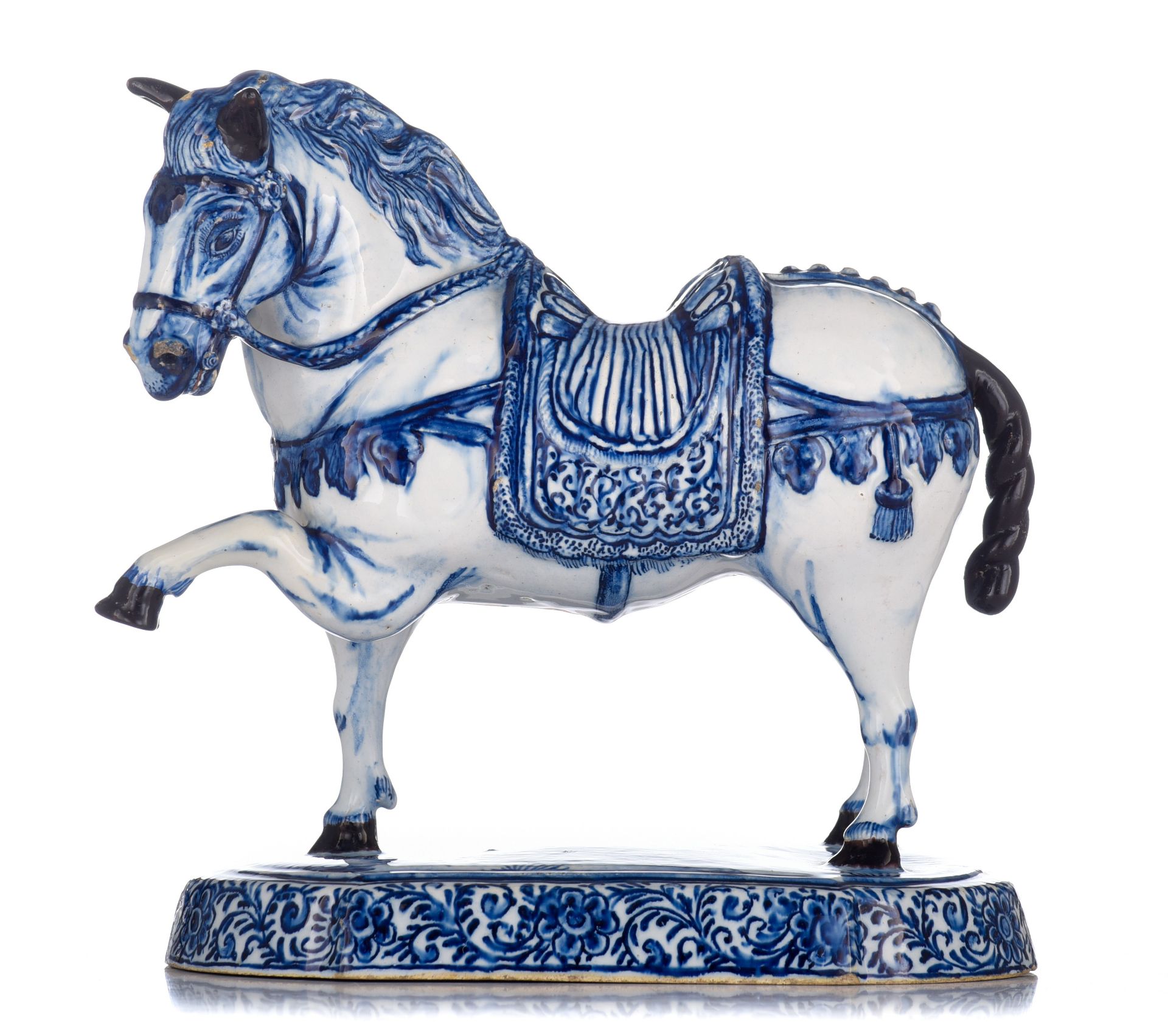 A large Delft blue and white figure of a circus horse, marked Jacob van der Kool, early 18thC, H 23