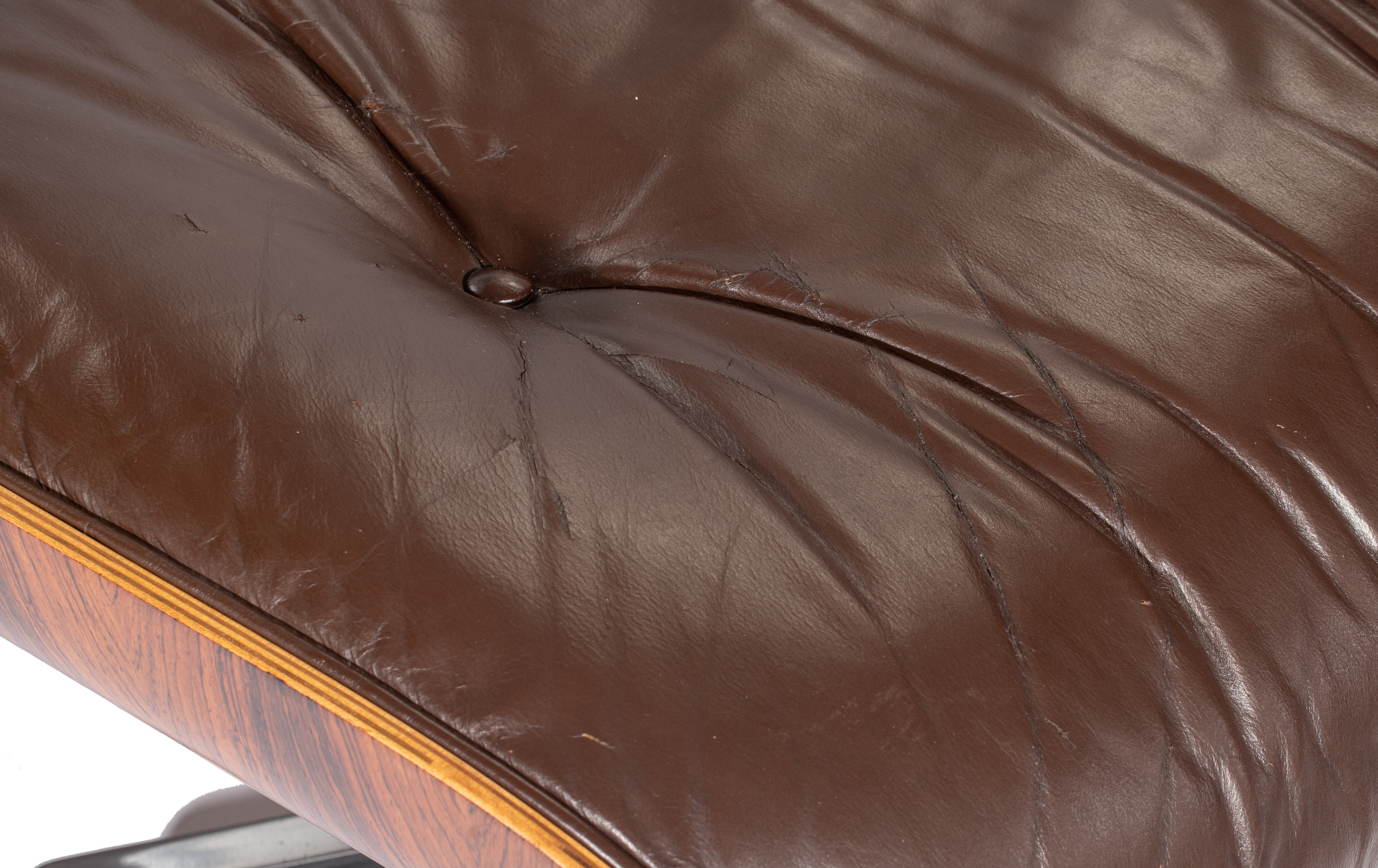 An Eames lounge chair with a matching ottoman, late 70s edition, marked Herman Miller, H 42,5 - 80 - - Image 14 of 15