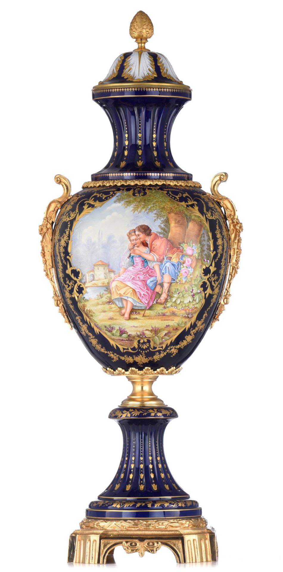 An imposing Sèvres type vase and cover, decorated with a central gallant scene, signed 'C. Niccolier