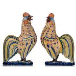 A pair of Dutch Delft polychrome figures of cockerels, late 18thC, H 21 cm