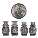 (T) A collection of Chinese Nanking stoneware vases and a plate, 19thC, H 32,5 - 34 cm - ø 36,5 cm (