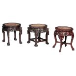 Three Chinese hardwood bases with a marble plaque, Tallest H 48 cm