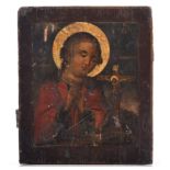 (T) A half-length figure of a saint in adoration of a crucifix, Russia, 19thC, 26 x 31 cm