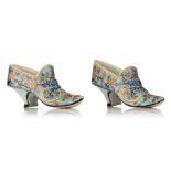 A fine pair of Delft polychrome floral decorated models of shoes, mid 18thC, marked, H 6,5 - W 14 cm