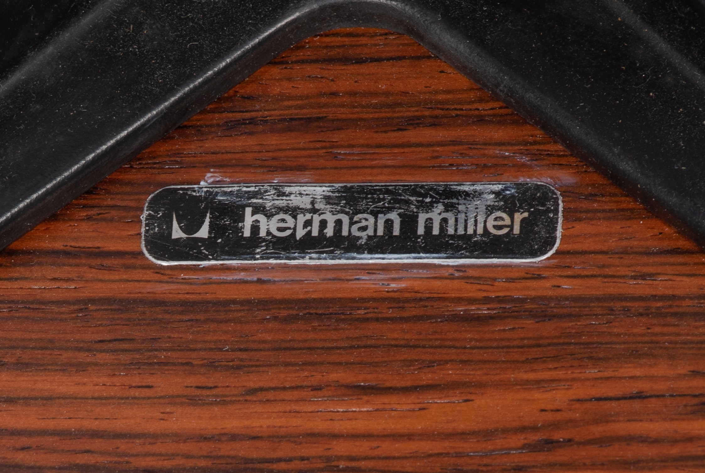 An Eames lounge chair with a matching ottoman, late 70s edition, marked Herman Miller, H 42,5 - 80 - - Image 8 of 15