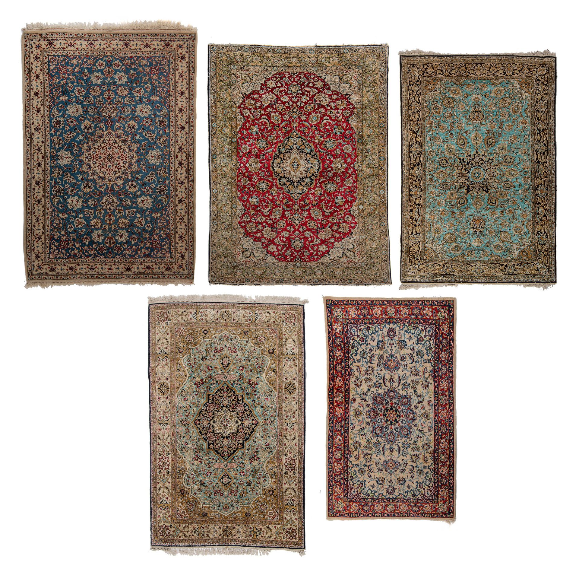A collection of 4 Iran Ghoum rugs, added a Persian Nain rug (+)
