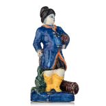 A fine Dutch Delft polychrome figure of a tobacco merchant, the second half of the 18thC, H 17 cm