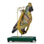 An exceptional Dutch Delft polychrome model of a parrot in a ring, 18thC, H 23 cm
