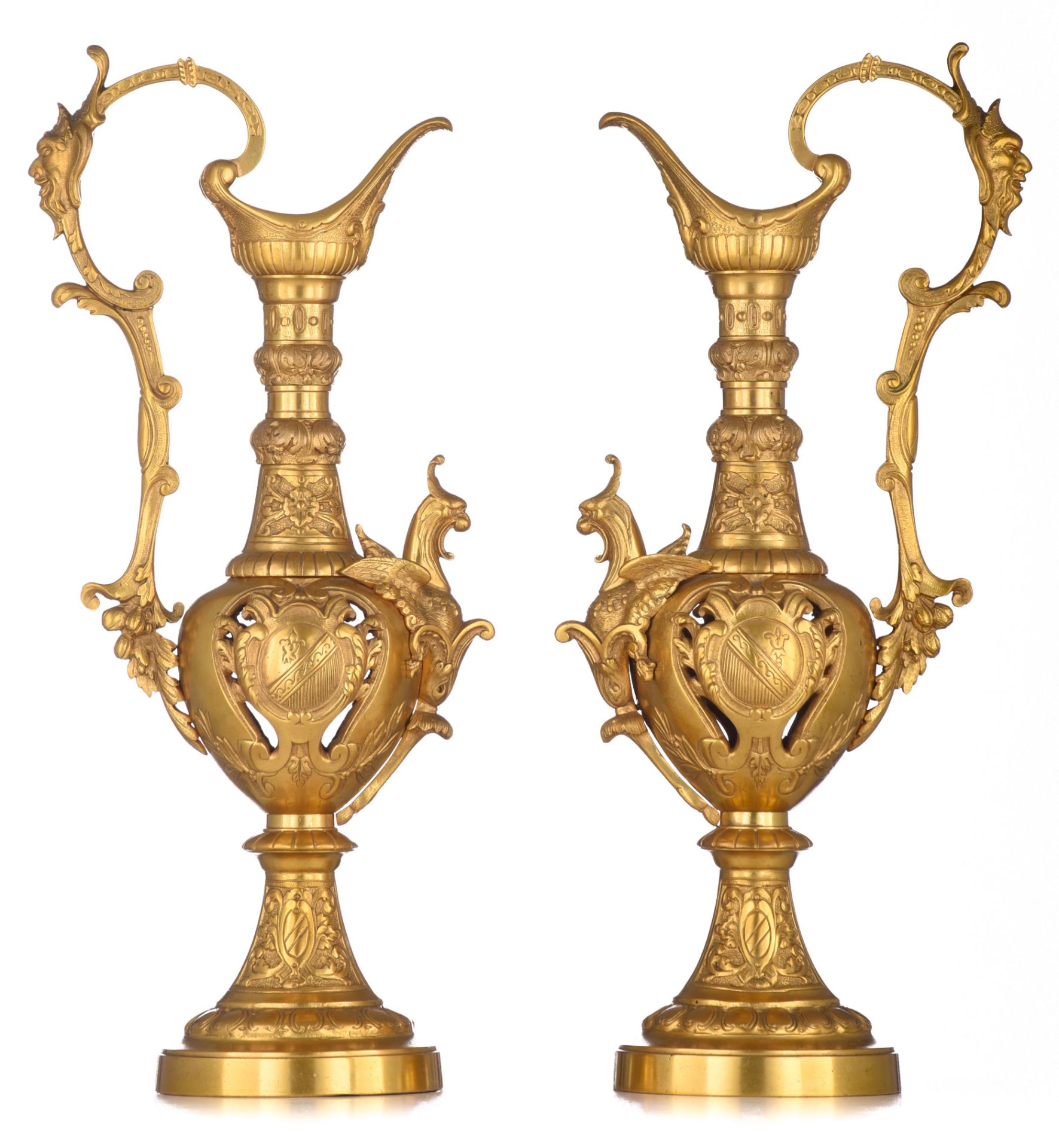 (T) A decorative pair of gilt bronze Renaissance inspired pitchers, H 50,5 cm