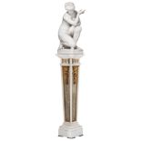 A Carrara marble figure of the crouching Aphrodite on a matching pedestal, possibly 19thC, H 66,5 -