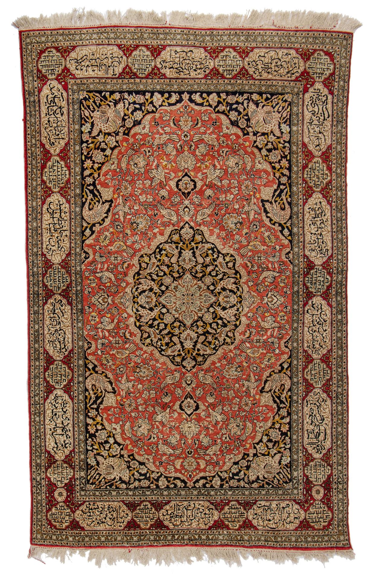 An Iran Ghoum carpet, floral decorated with birds, the borders with texts, silk, 137 x 216 cm