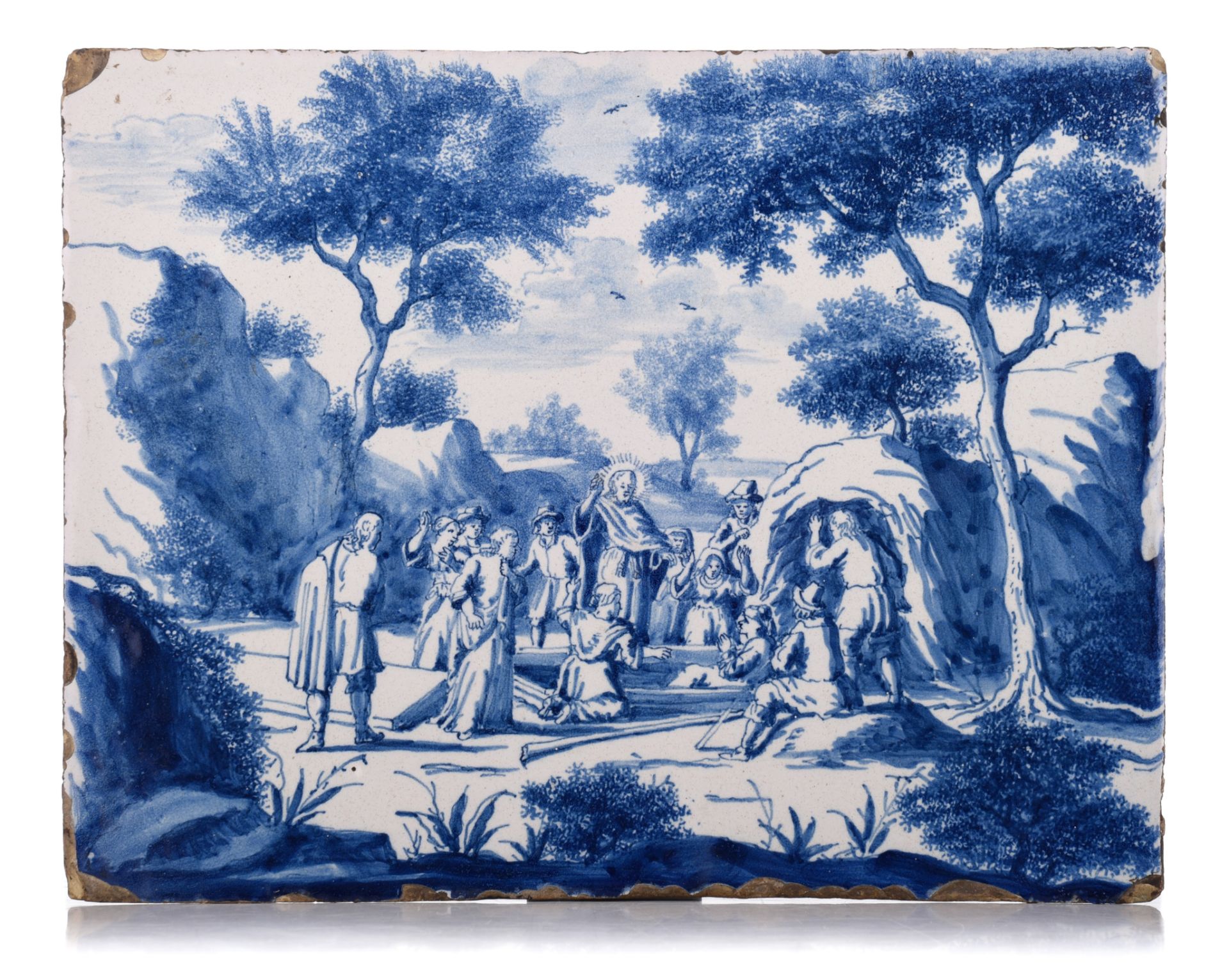 A fine blue and white Dutch Delft plaque depicting Saint John preaching in the wilderness, 17thC, 25
