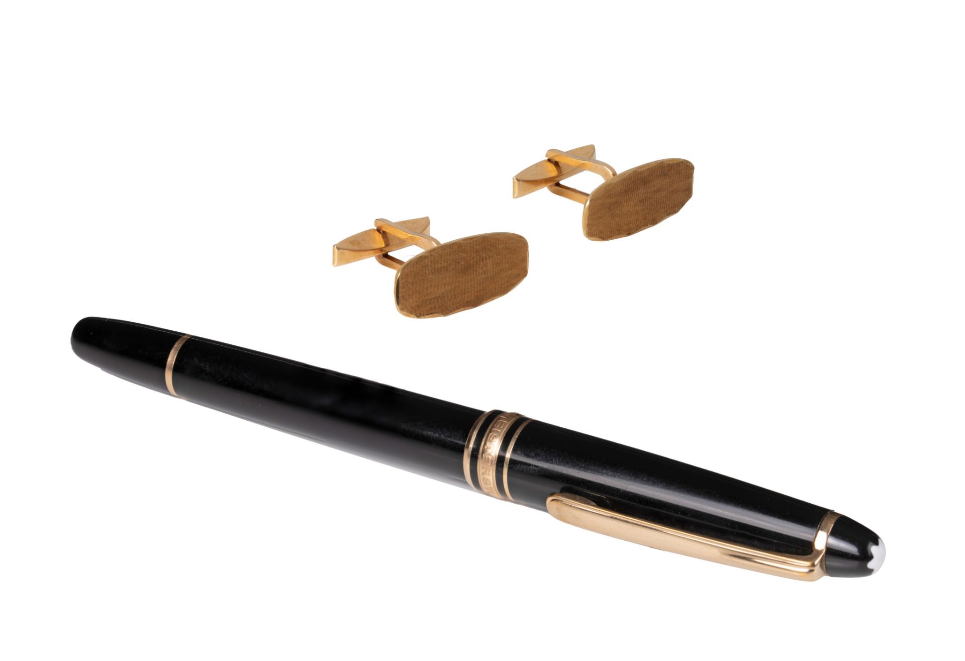 (T) A pair of 18ct yellow gold cuffs and a Montblanc pen