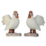 A charming pair of Dutch Delft polychrome figures of chickens, 18thC, H 16 cm